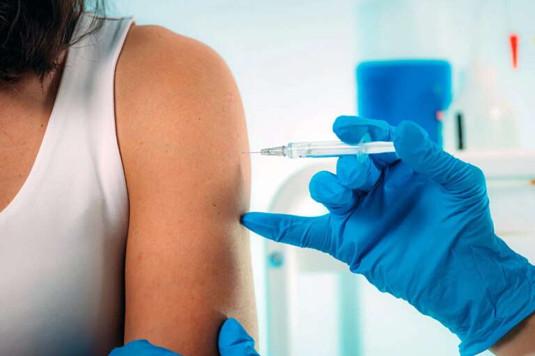 1800x1200 woman being vaccinated